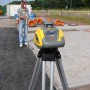 Spectra Precision LL100N Self Leveling Laser With Tripod and GR153 Grade Rod Metric